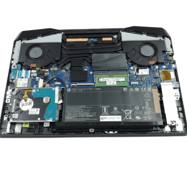 30 - Empowering Businesses: Your Premier eTIMS Integrators, Resellers, and Consultants Open laptop showing internal components: battery, RAM, SSD/HDD, cooling fans, and motherboard at a top-down view.